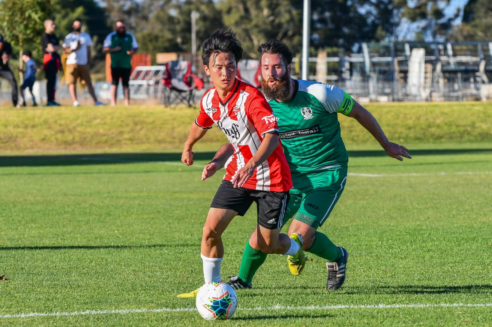 Minagi on the ball against Sale United, 2023
