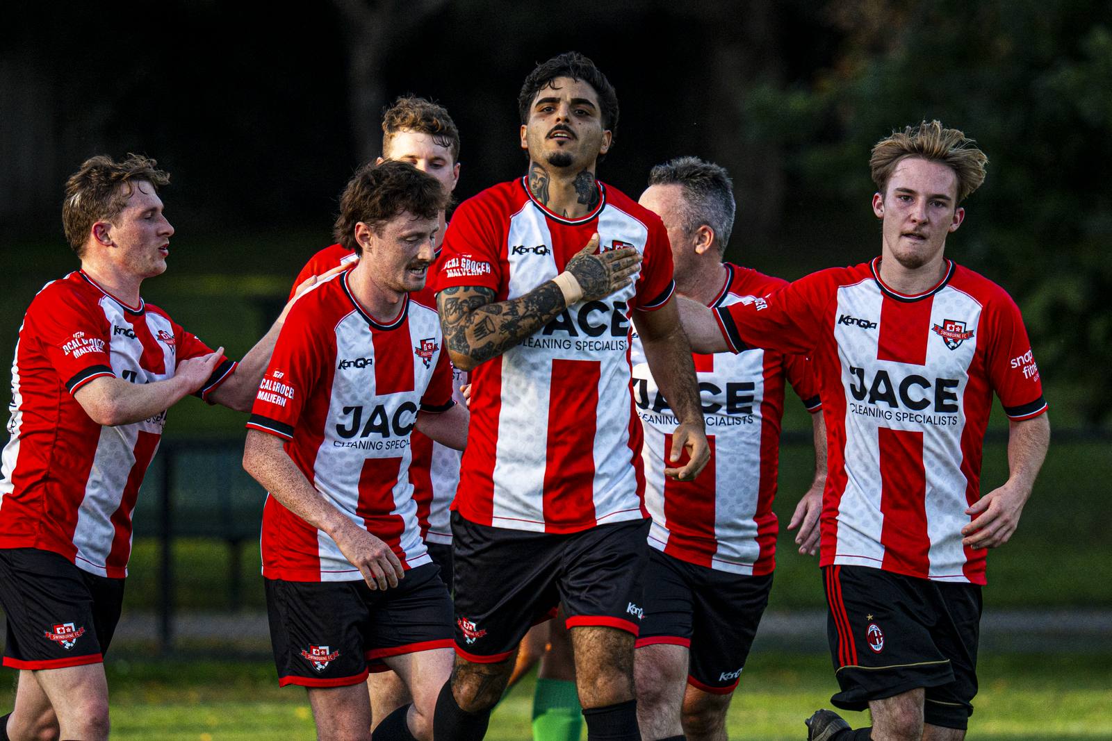 Swinburne FC players celebrating a goal