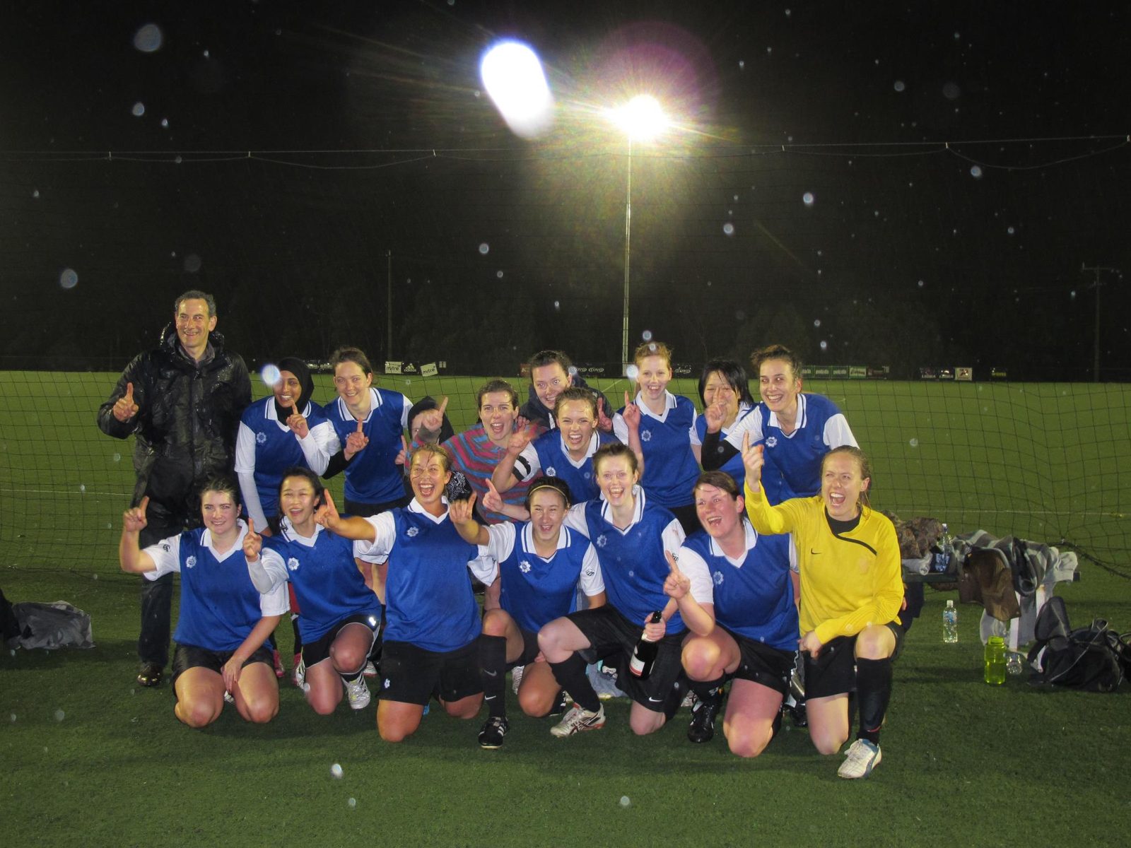 The women's side celebrate the 2012 championship
